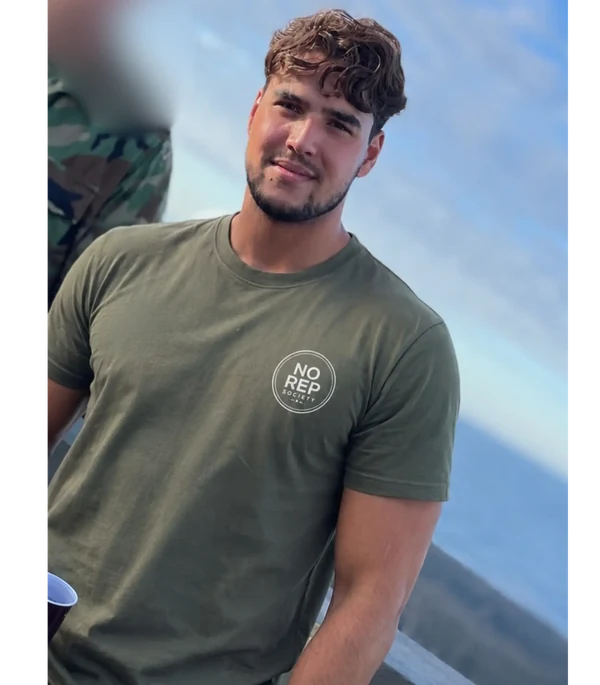 The founder wearing The No Rep Society tee
